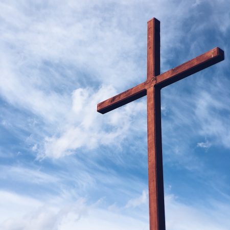 a brown wooden cross